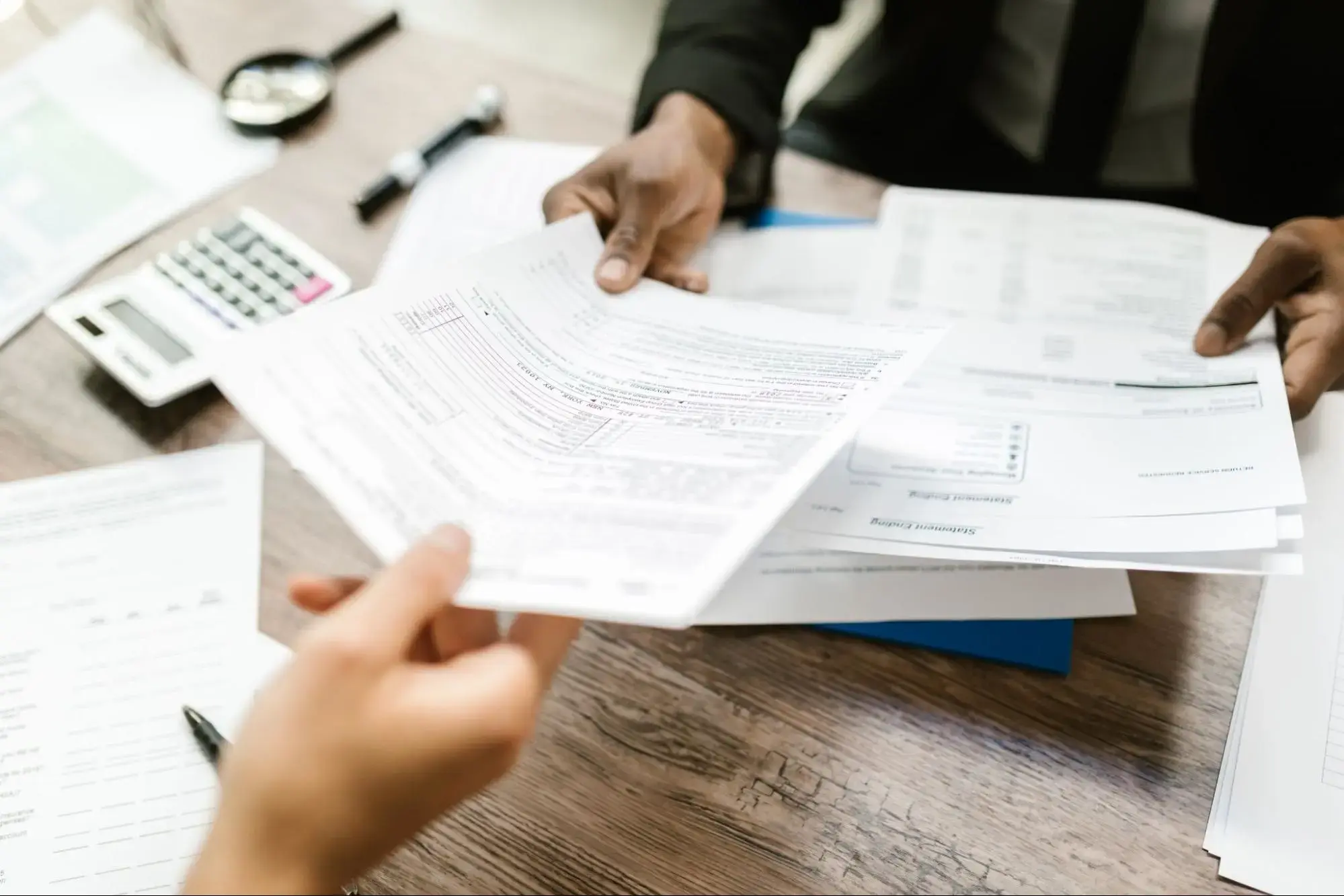 A man receiving his credit term life insurance documentation before buying the policy.