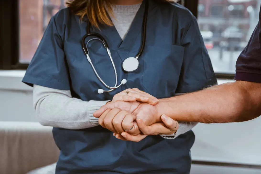 A nurse that is doing checks in order to discover what the patients specific health care needs are.