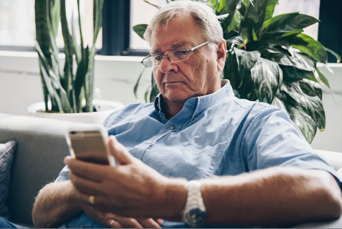 A man reviewing which supplement plan is best for him.