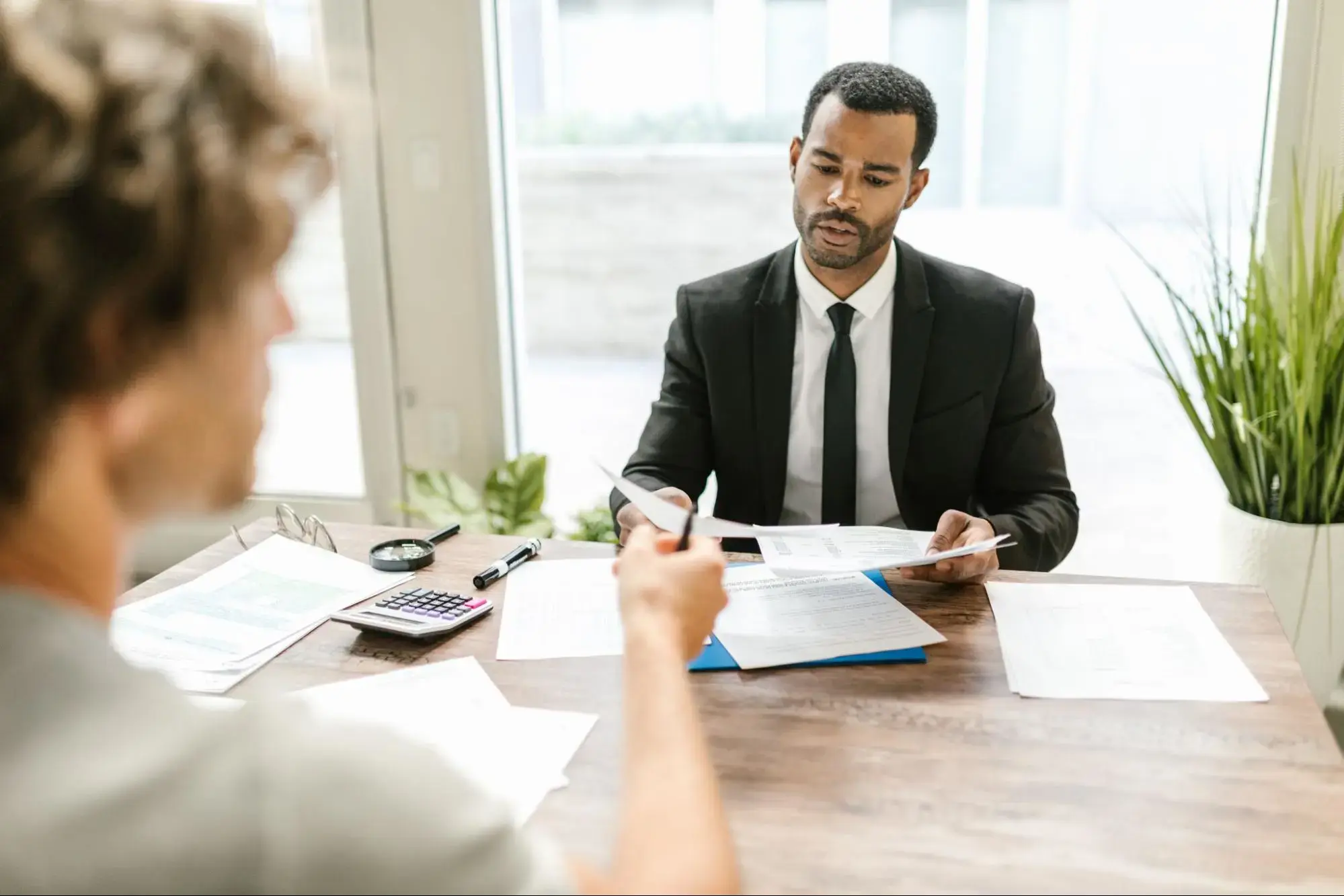 An insurance agent explaining if Return of Premium Term Life Insurance Plans are worth it.