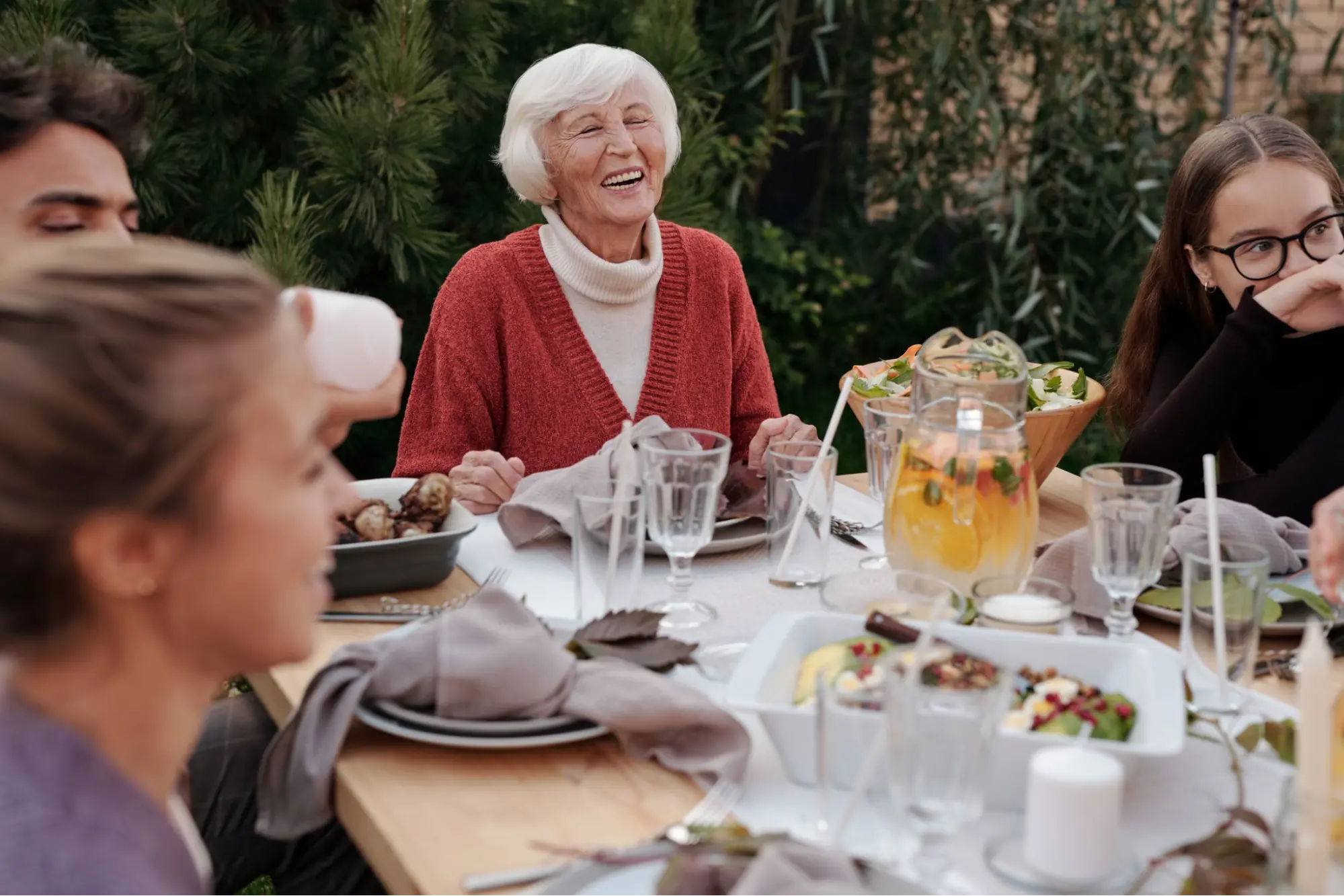 An elderly woman who is happy because she knows her physical therapy is covered by Medicare.