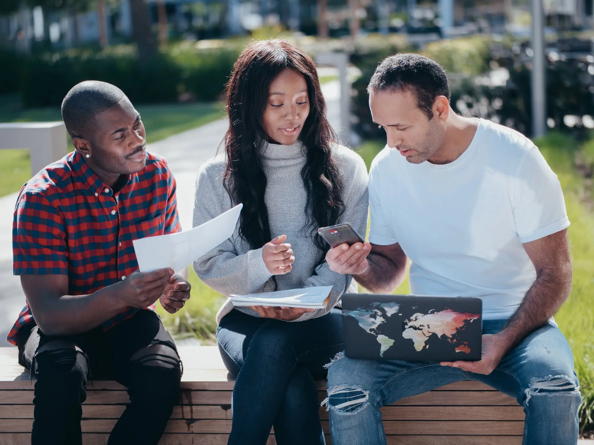 A group of people deciding whether to choose whole life insurance and term life insurance.