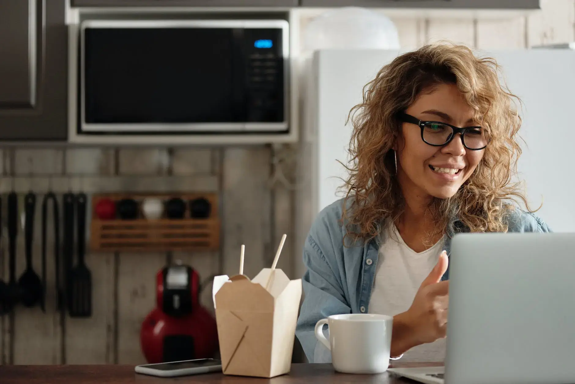 A woman who is smiling because she knows she will be covered in case of an accident.