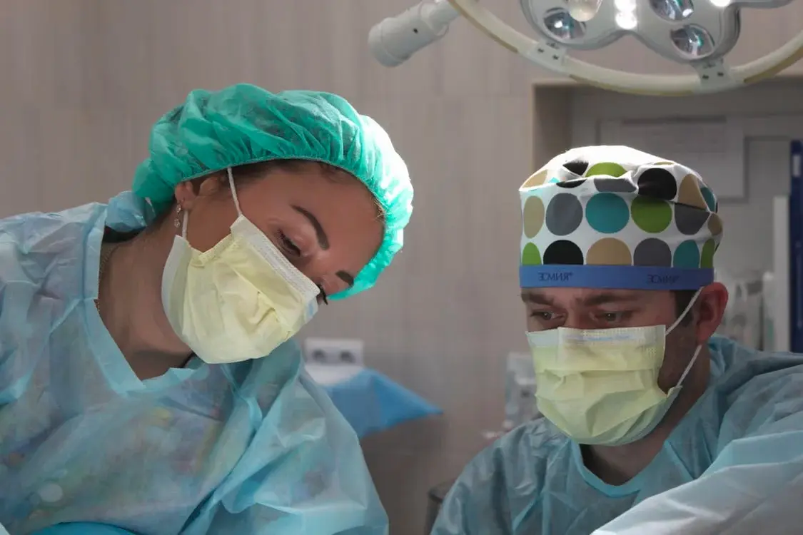 Surgeons performing surgery