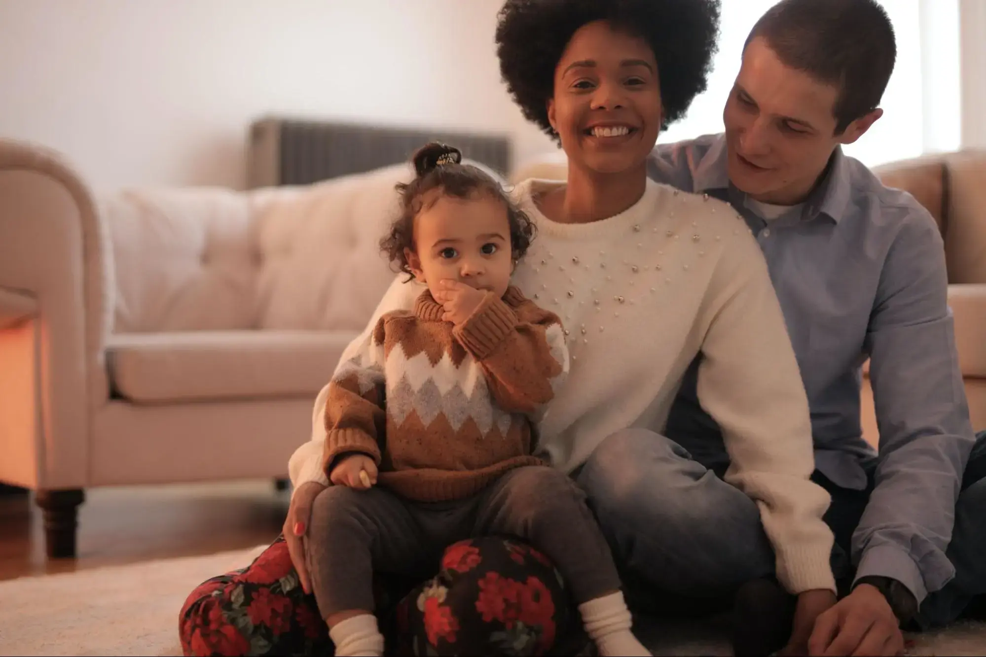 A happy family who have just bought First-to-Die Life Insurance.